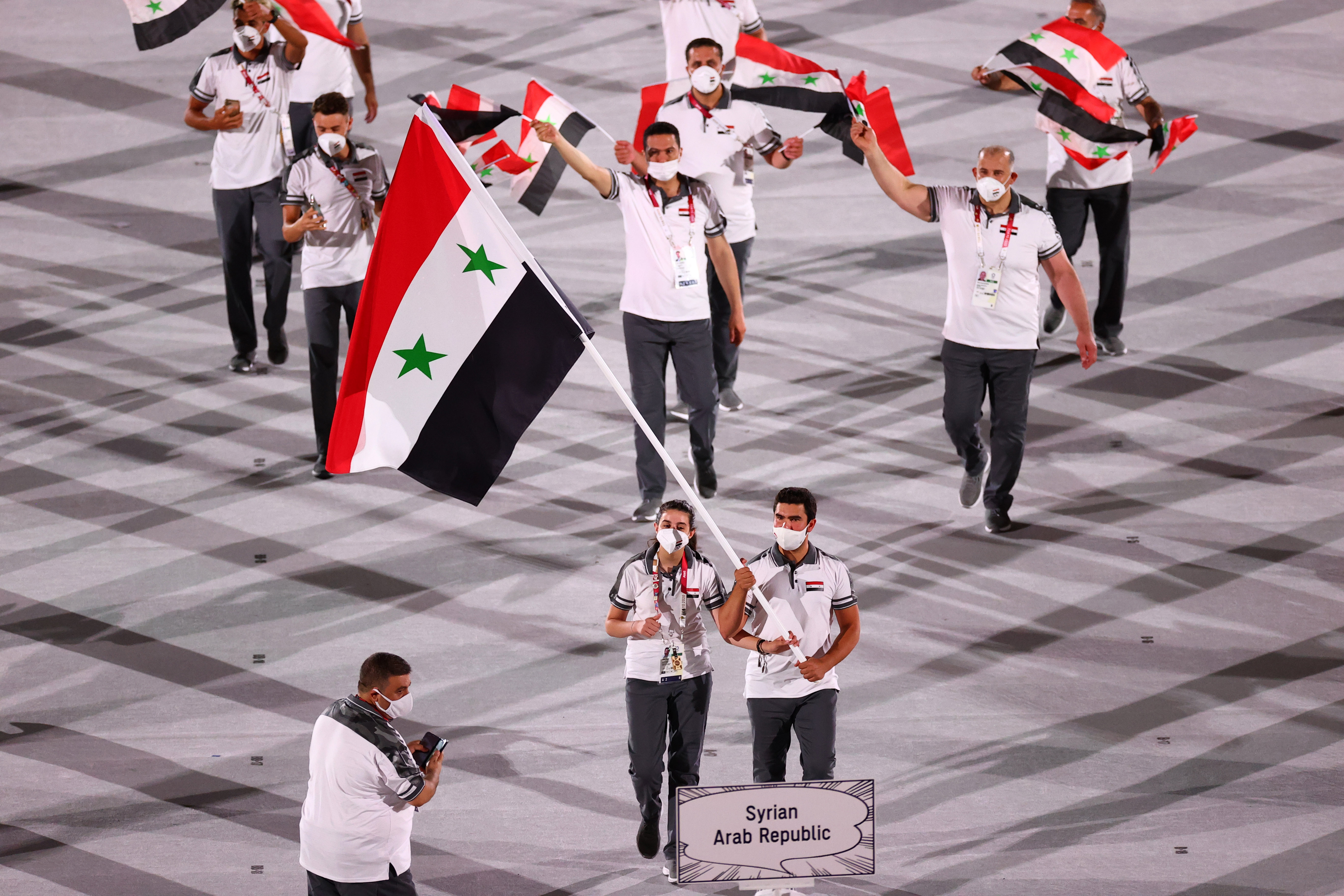 2021-07-23t143736z_1952447131_sp1eh7n14mmhq_rtrmadp_3_olympics-2020-ceremony-opening.jpg