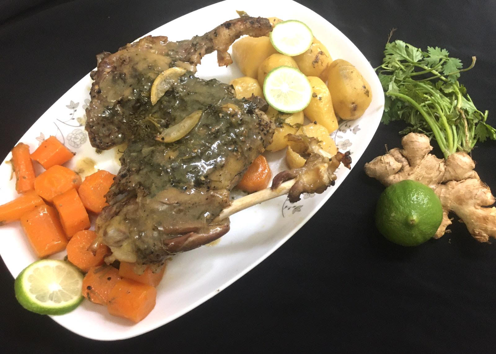 Whole mutton leg roast with baked vegetables 