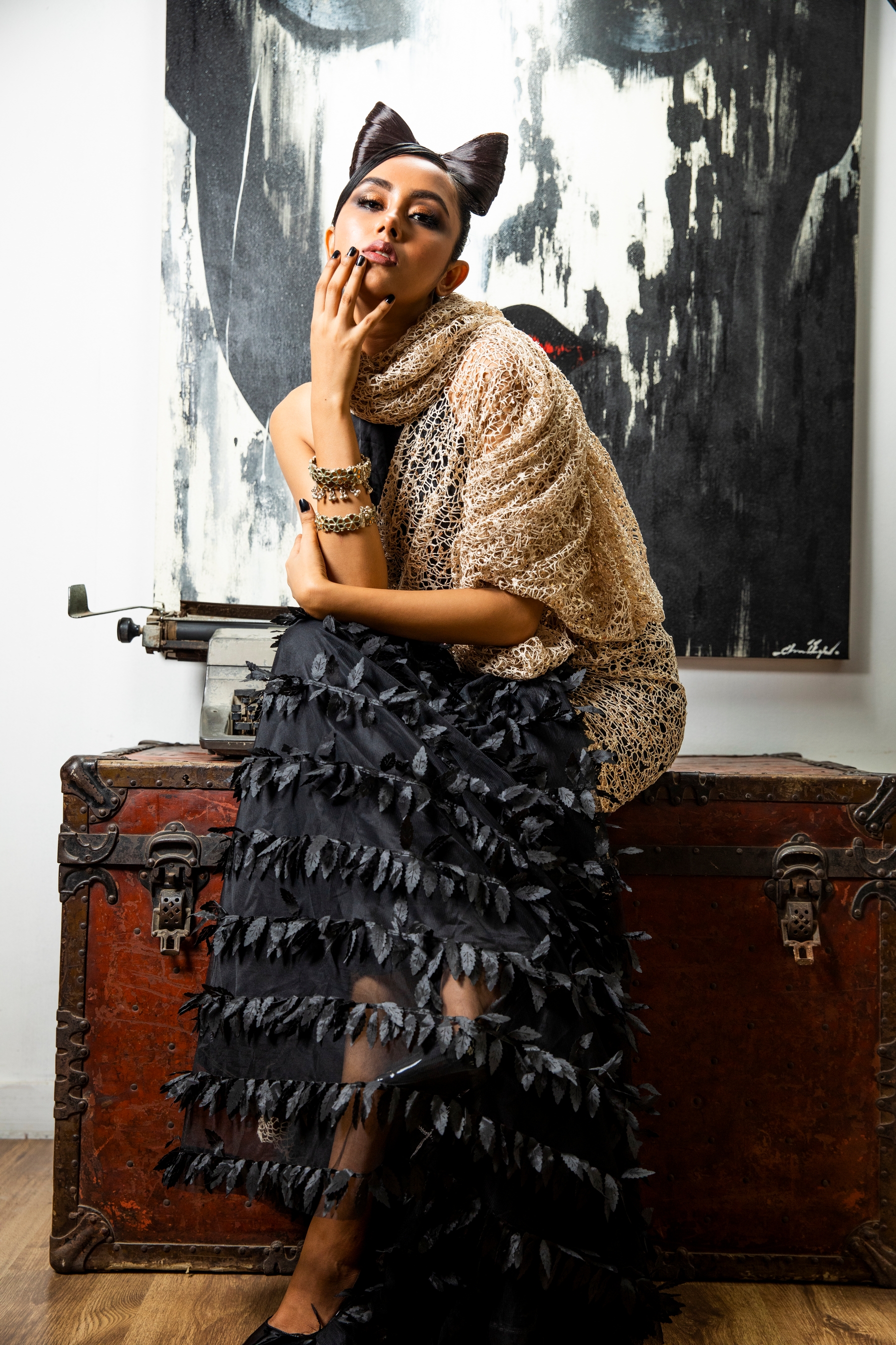 Black and gold colour sari and shawl