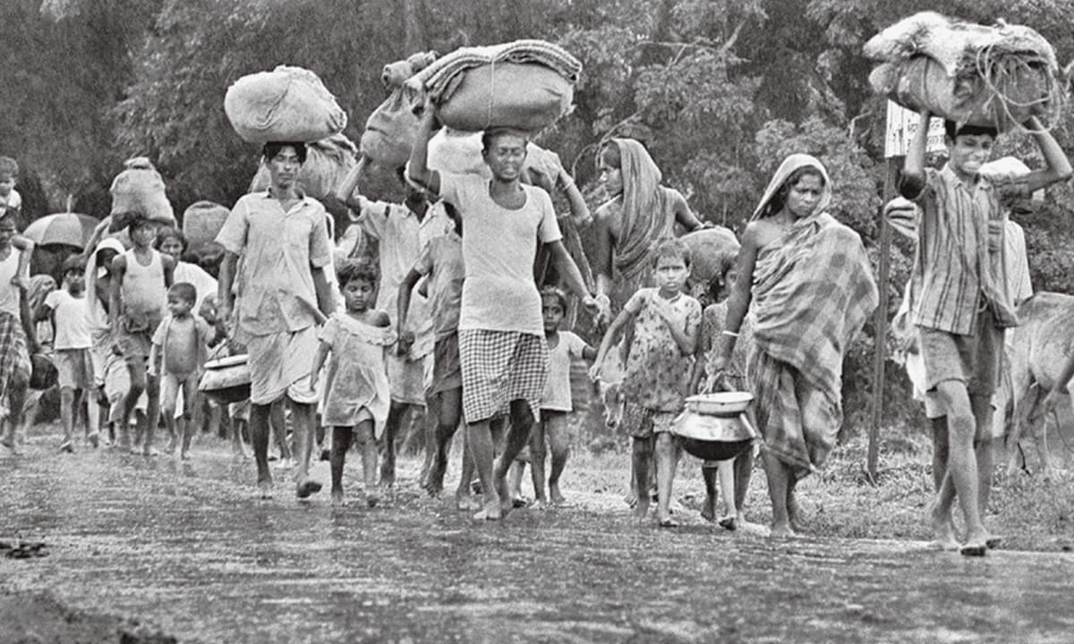 op_2_-_refugees_seeking_shelter_in_1971_-_mujibnagar_website.jpg