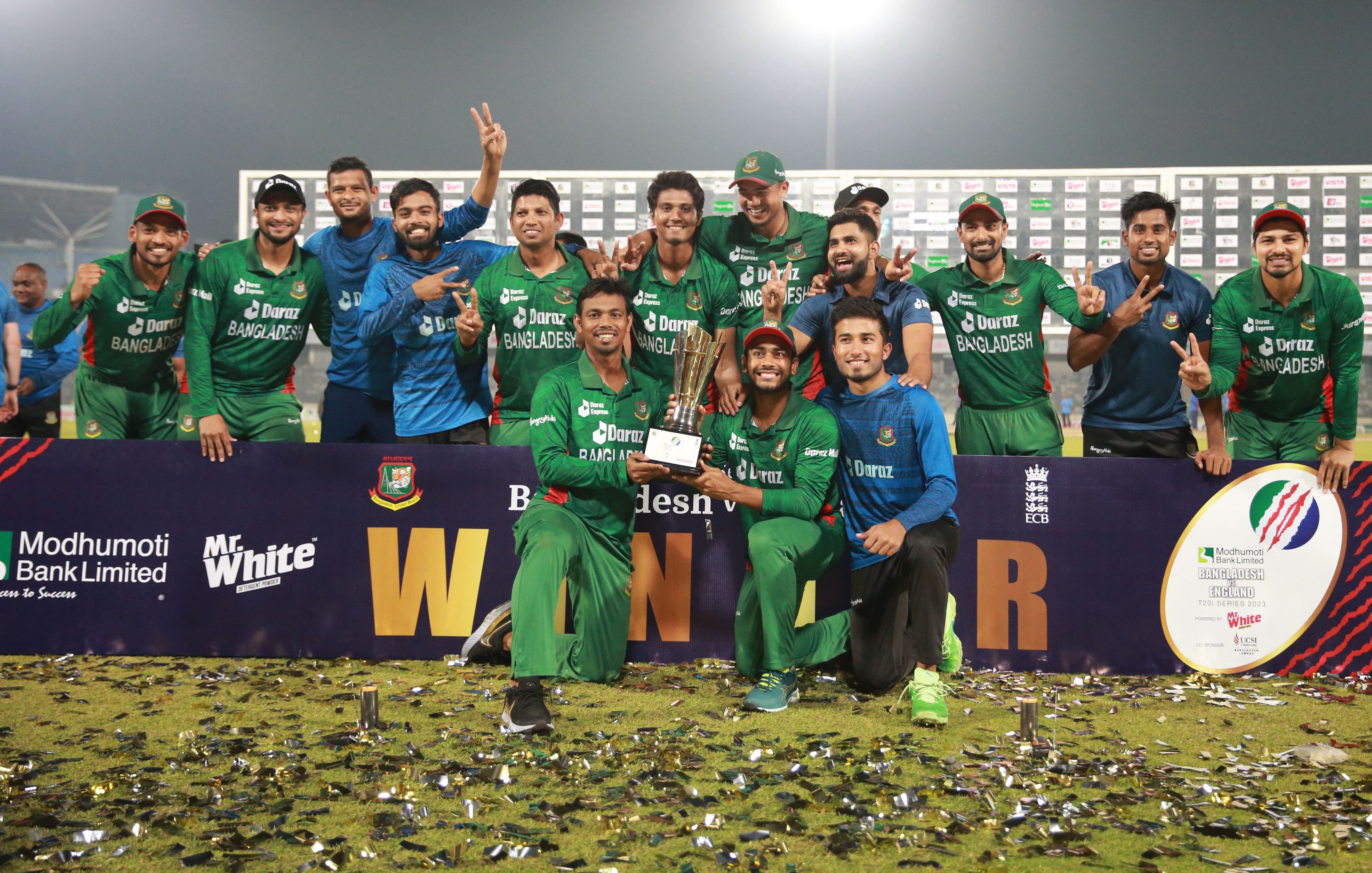 Bangladesh players pose with Trophy