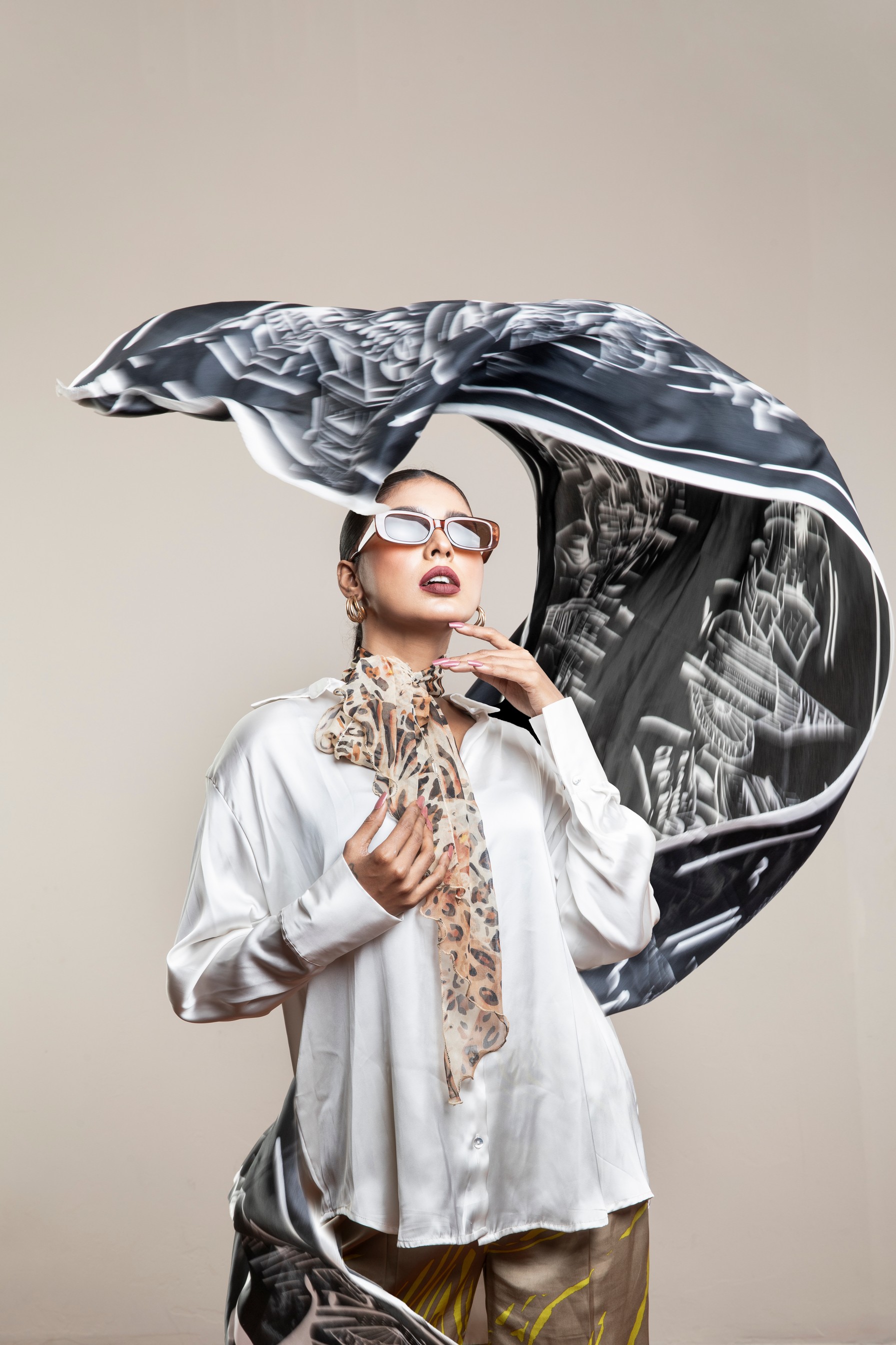 Style drab and dreary office wear instantly with stylish scarves