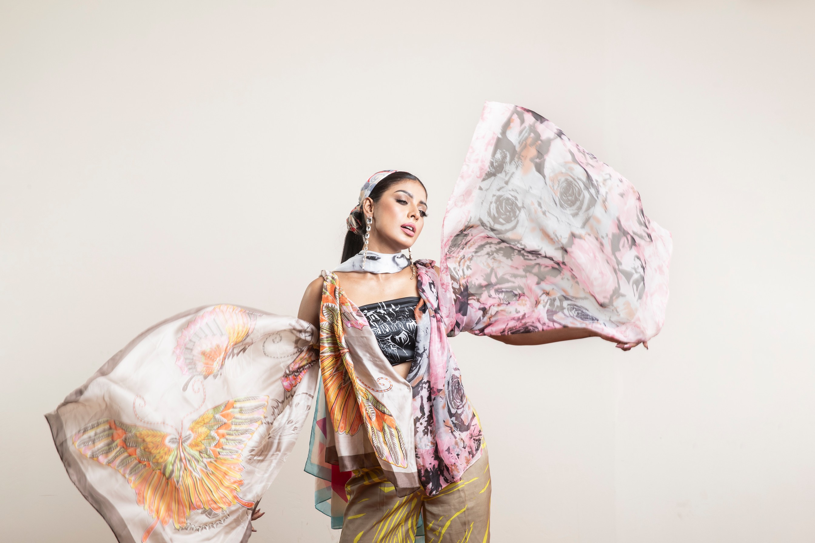 Style drab and dreary office wear instantly with stylish scarves