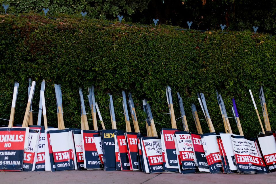 Striking Hollywood writers reach tentative deal with studios