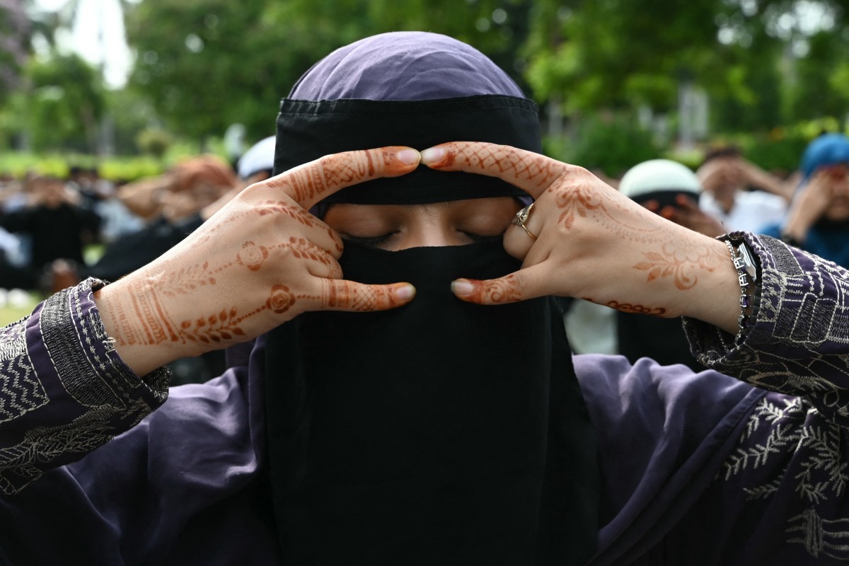 Muslim woman participating in yoga