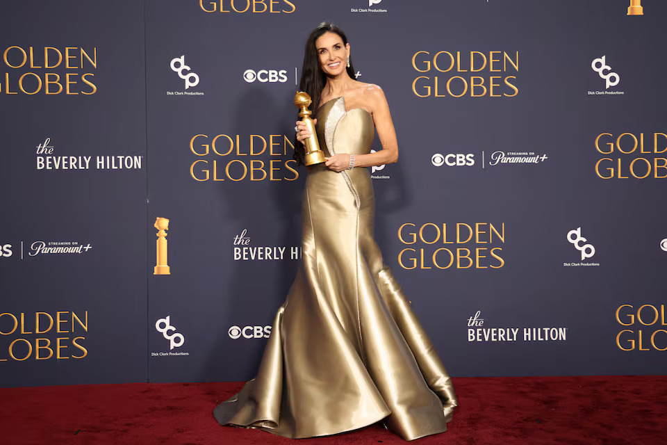 Demi Moore poses with the award for Best Performance by an Actress in a Motion Picture - Musical or Comedy, for The Substance, at the 82nd Golden Globe Awards in Beverly Hills, Californiajpg
