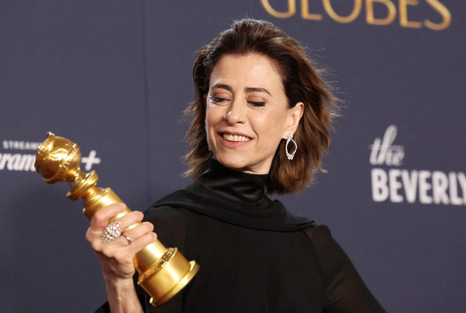 ernanda Torres poses with the award for Best Performance by an Actress in a Motion Picture — Drama for "I'm Still Here" at the 82nd Golden Globe Awards in Beverly Hills,jpg