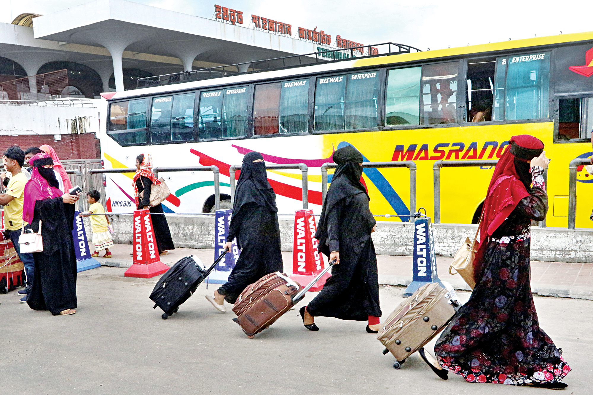 saudi_return_women_worker.jpg
