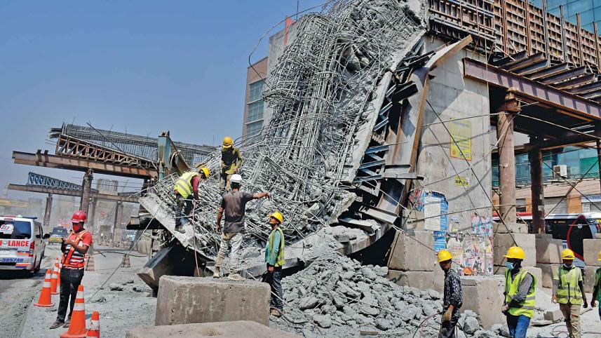 construction workers inspecting a collapsed