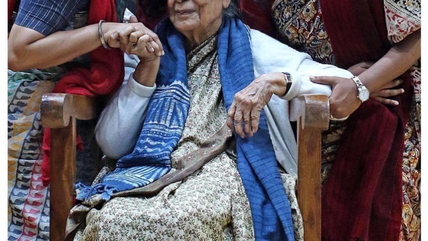 Munira Morshed Munni and photographer Sabina Yesmin with Sayeeda Khanam (C) on her 80th birthday.jpg