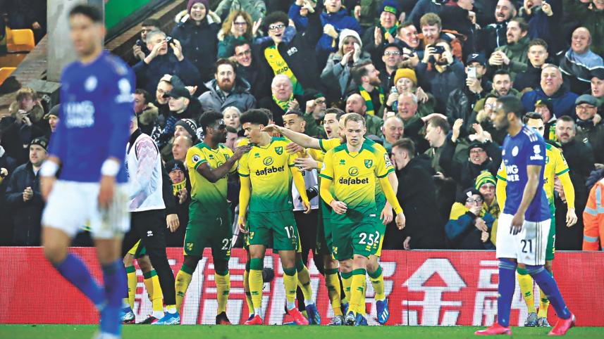 Norwich City players celebrate Jamal Lewis.jpg
