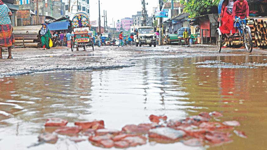 Postogola-Sadarghat road.jpg