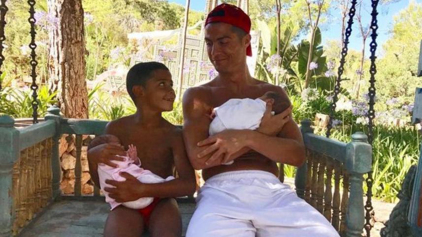 Ronaldo with newborns.JPG