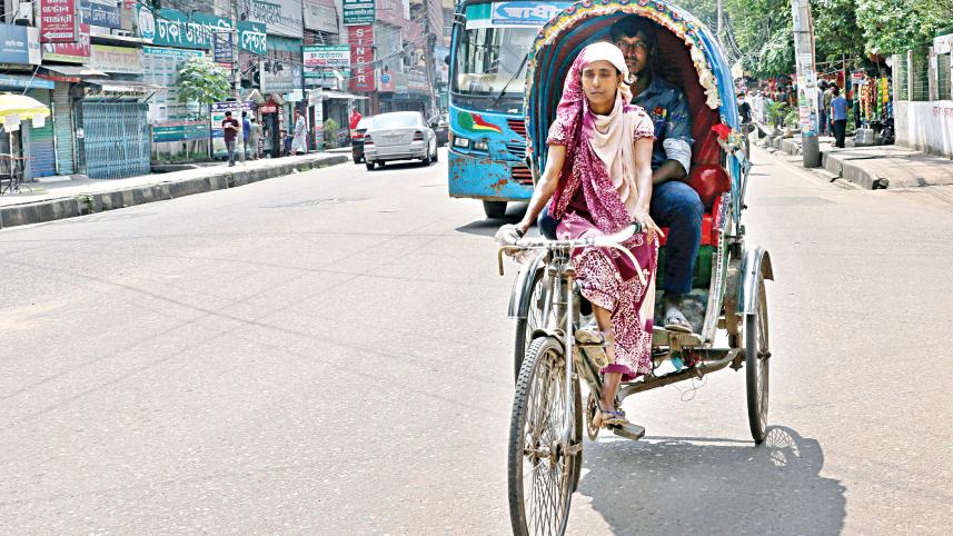 Sapna pulls a rickshaw.jpg