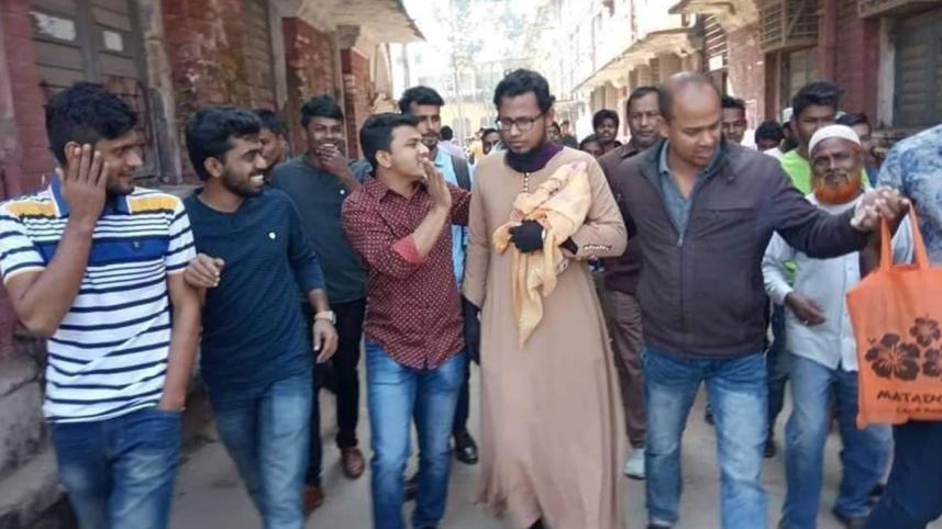 Burqa clad youth arrested