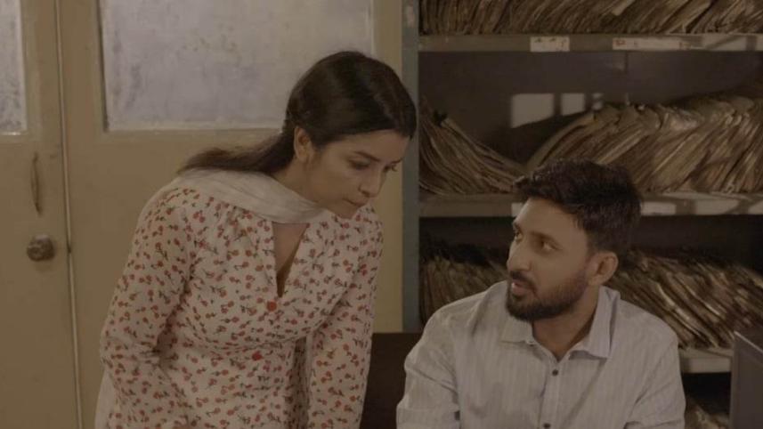 Elina Shammi and Manoj Pramanik in Muntasir.