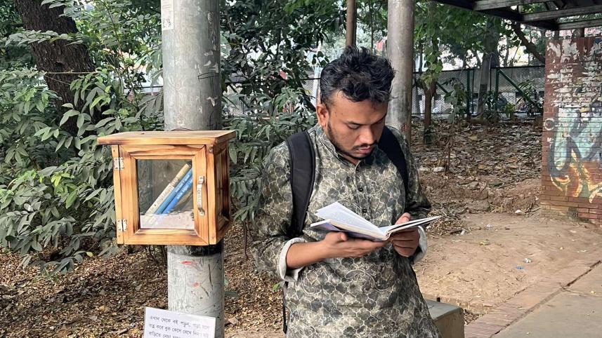 reading books in Dhanmondi Lake
