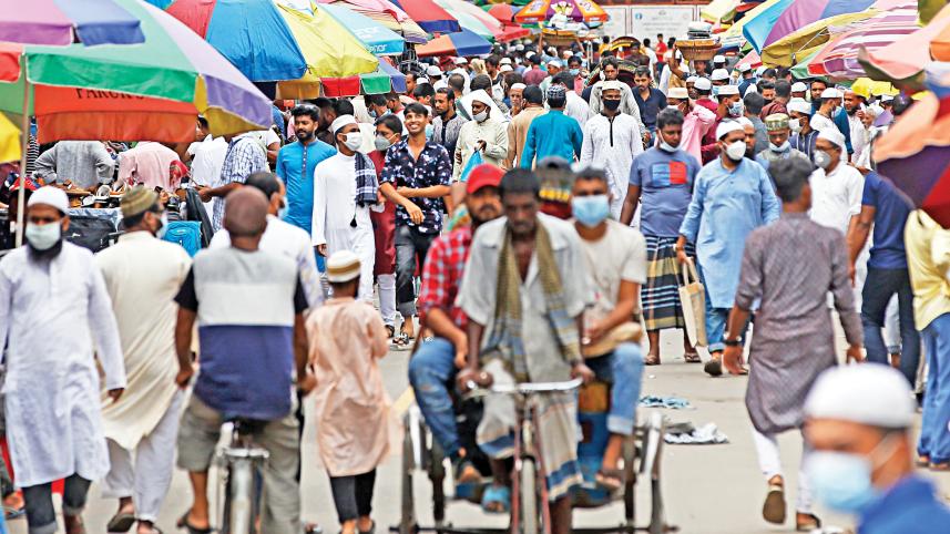 people crowd the street
