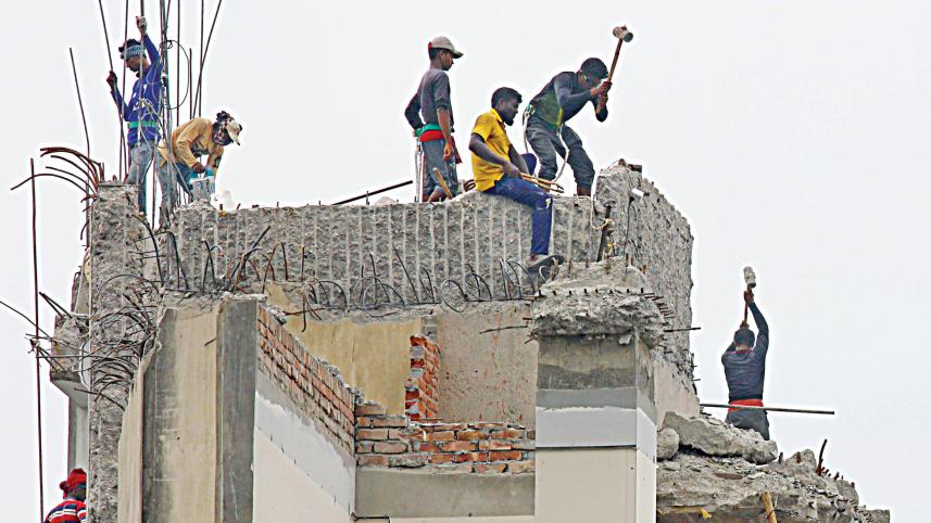 workers demolishing