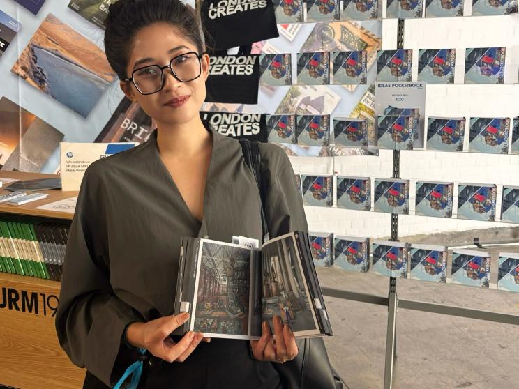 Dristi Chakma with the Drawing of the year publication. jpg
