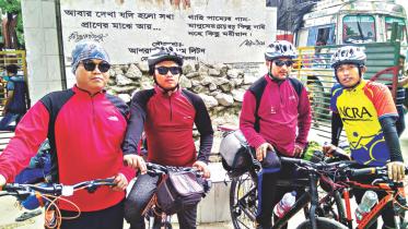 Four Nepalese cyclists.jpg