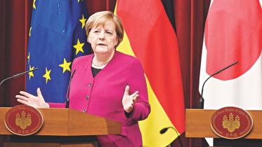 merkel urges.jpg