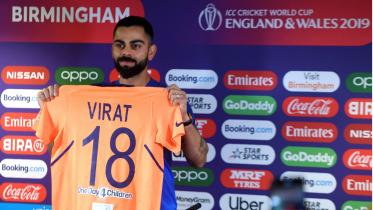 Virat Kohli Orange Jersey.jpg