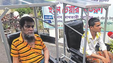 Youth builds solar-powered tricycle