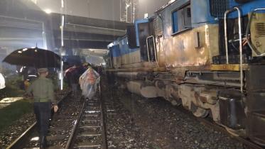train hits crane