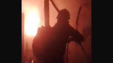 refugee_camp_fire.jpg