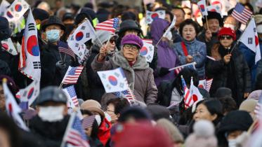 afp_20241204_36pd4d7_v1_preview_skoreapoliticsconflict.jpg