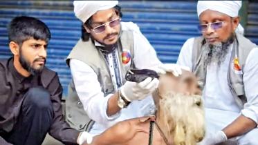 Viral video shows fakir’s hair shaved off in Bangladesh