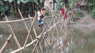 A single Bamboo Bridge over Nilkomol only lifeline for eight villages_c8c7.jpg