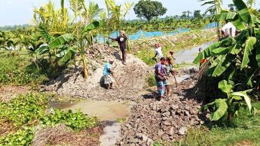 Encroached Dudkhawar Khal freed from influential grabber in Kurigram.jpg