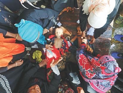 Bodies of Rohingya children.jpg