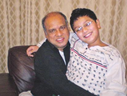 dr_ahmed_with_his_youngest_son.jpg