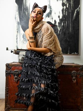 Black and gold colour sari and shawl