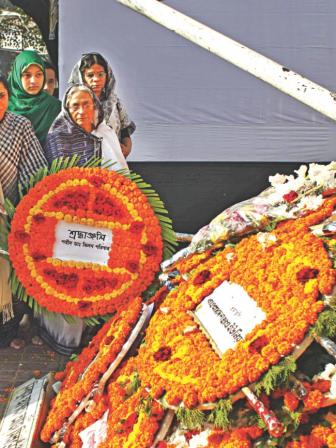 Lays a wreath at Dr Milon’s memorial